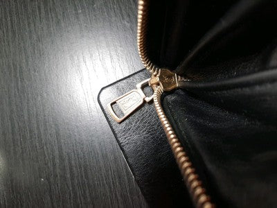 YSL Yves Saint Laurent Leather Zippy Zip Around Long Wallet Black Colour. 